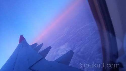 朝日が昇るシベリア上空